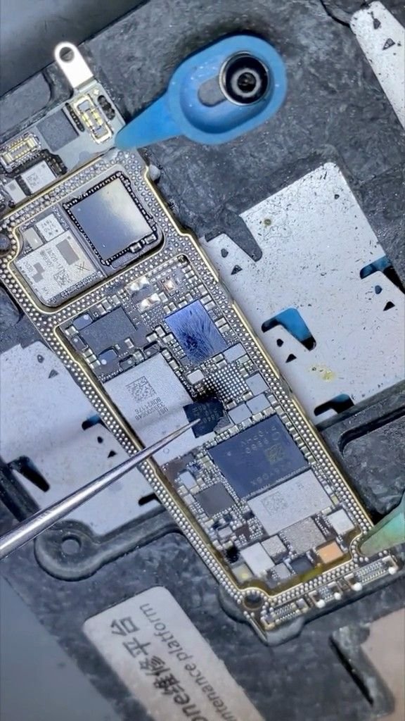 Close up of technician working under a digital microscope